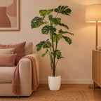 Künstliche Monstera (Monstera deliciosa), ca. 180 cm – Raumbild im Übertopf elho Brussels Round Weiß, Übertopf nicht enthalten